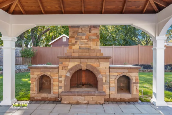 Craft your perfect outdoor retreat with our bespoke stone fireplace, designed for elegance and utility.