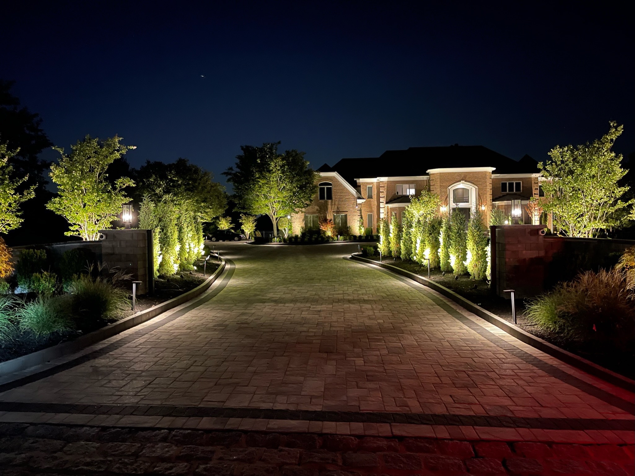 Scenic View - Landscape Lighting on Paver Driveway